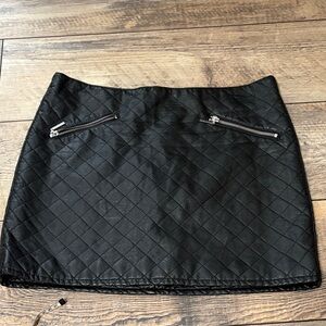 Divided Black Quilted Mini Skirt with Zipper Accents